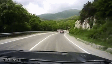 1339605761_truck_tips_and_hits_car.gif