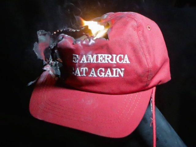 MAGA-Make-America-Great-Again-hat-burning-at-Berkeley-Getty-e1488567121474.jpg