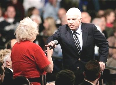 Mccain-taking-mic-from-woman1.jpg