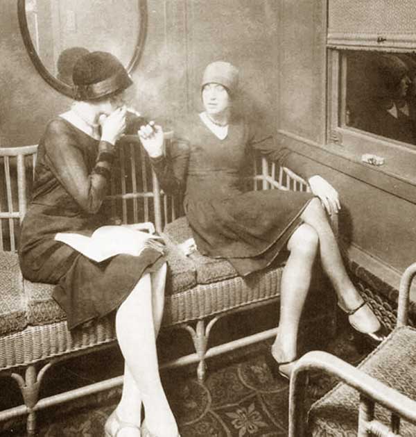 1920s-fashion-Flapper-smoking-on-a-train.jpg