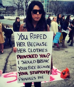 woman-with-rape-banner.jpg