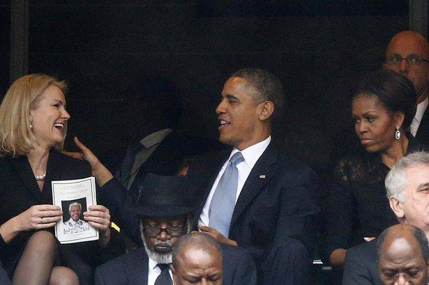 Michelle-Obama-unhappy-at-Mandela-memorial-2912452.jpg