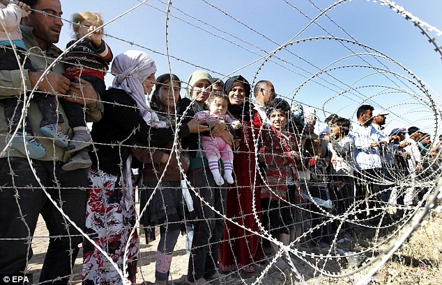 1411472051839_wps_8_epa04412785_Syrian_refuge.jpg