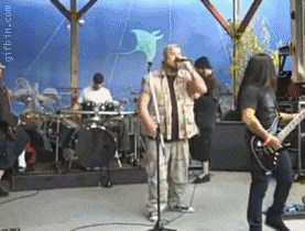 1277988694_guitarist-owns-vocalist.gif