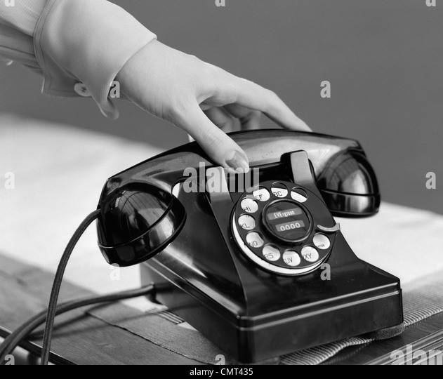 1940s-womans-hand-picking-up-phone-receiver-cmt435.jpg