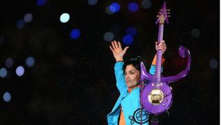_89383355_princeglyphguitar.jpg