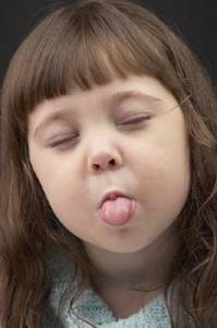 little-girl-sticking-tongue-out-199x300.jpg