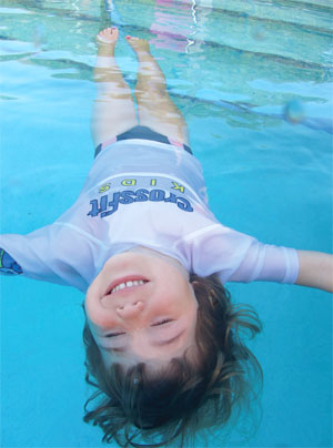 isr-child-floating-in-pool.jpg