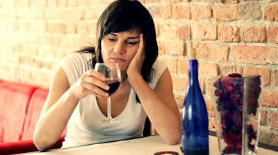 stock-footage-sad-pensive-woman-drinking-wine.jpg