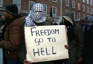 POSTERS+muslim_demonstration005+freedom+go+to+hell.jpg