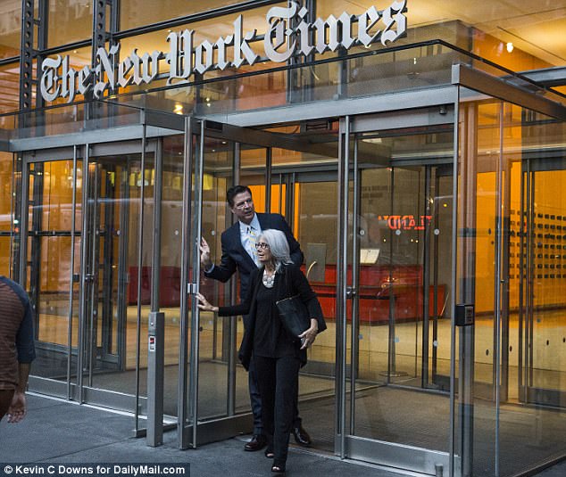 41A8C32A00000578-4630824-Former_FBI_director_James_Comey_leaves_The_New_York_Times_with_h-a-31_1498187279899.jpg
