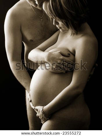 stock-photo-beautiful-pregnant-naked-young-women-in-sepia-23555272.jpg
