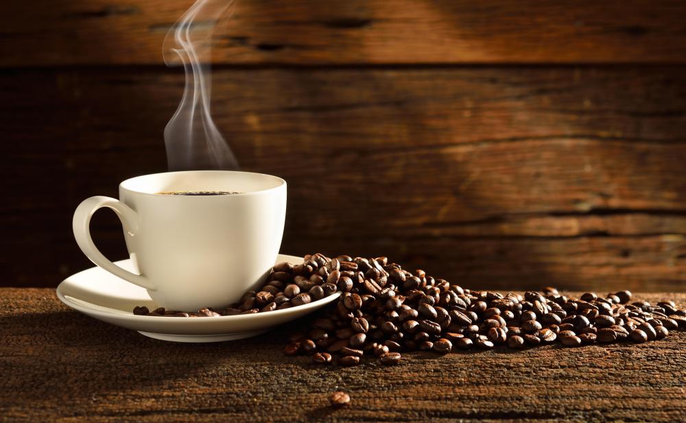 coffee-cup-and-beans-wood-background.jpg