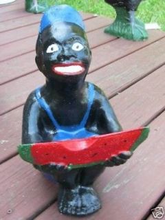 156050018_black-watermelon-boy-statue-lawn-jockey-cousinwfree-.jpg
