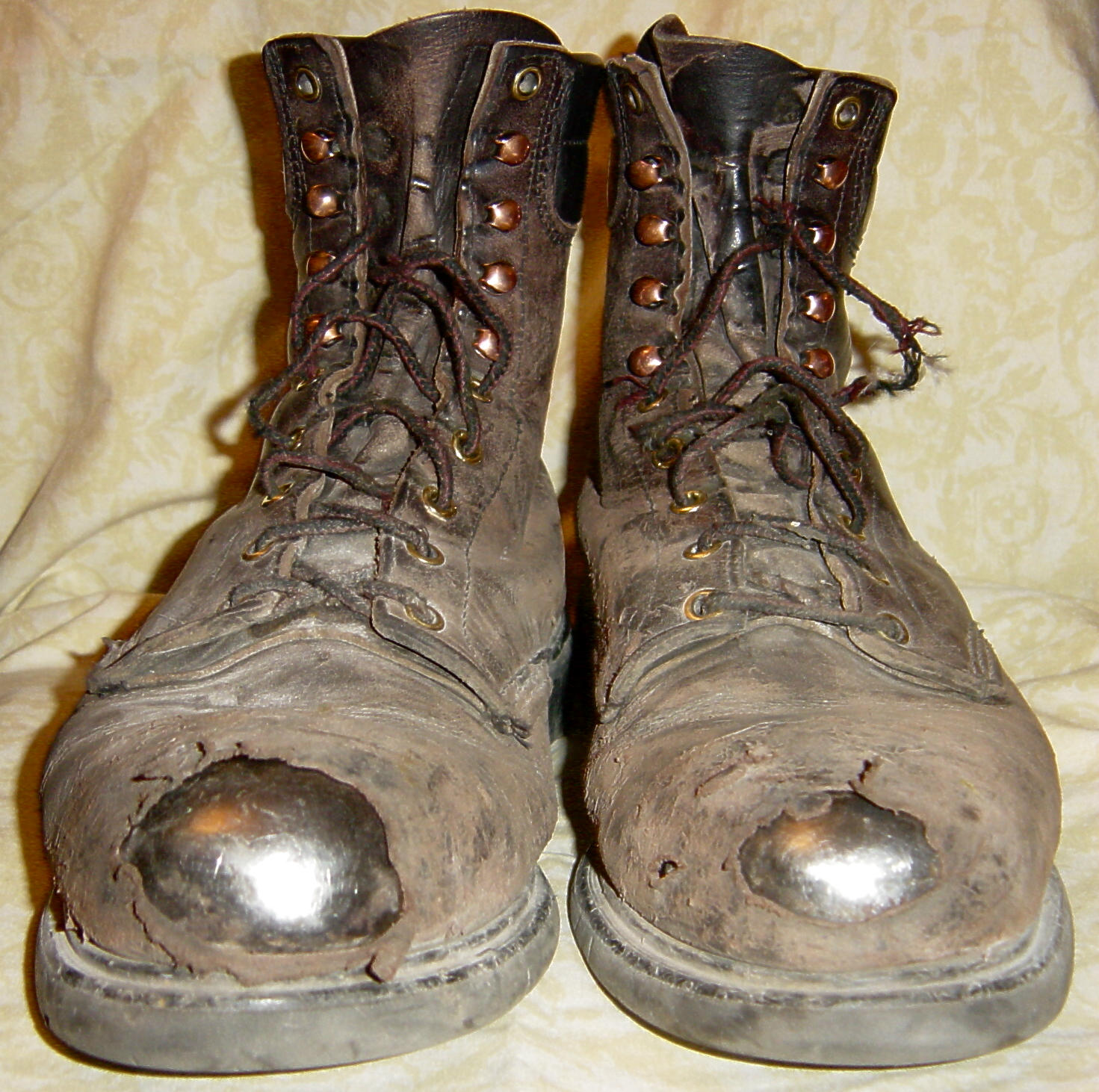 tattered_old_work_boots_by_fantasystock.jpg