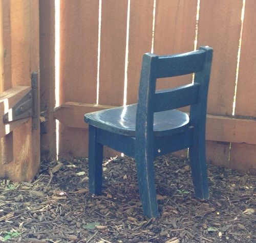 Heather-IL-kiddie-chair-in-corner.jpg