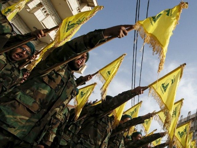 Lebanon-Hezbollah-members-with-flags-Reuters-640x480.jpg