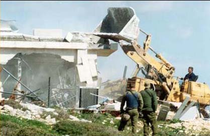 caterpillar_bulldozer_destroying_palestinian_home.jpg