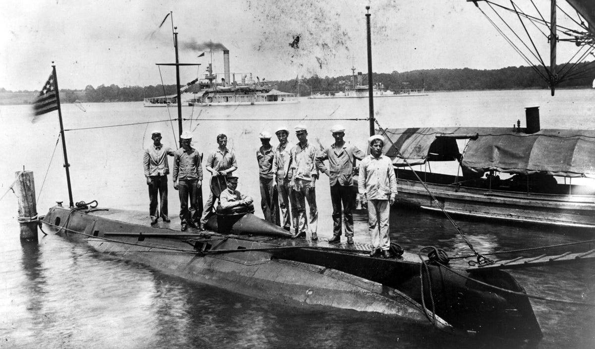 the-uss-holland-seen-in-this-photo-from-1900-was-the-navys-first-commissioned-submarine.jpg