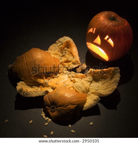 stock-photo-upset-jack-o-lantern-looking-at-smashed-pumpkin-2950105.jpg