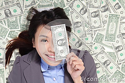 woman-happy-lying-money-bed-28117248.jpg