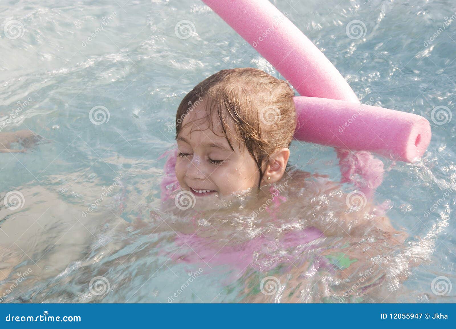 little-girl-swimming-12055947.jpg