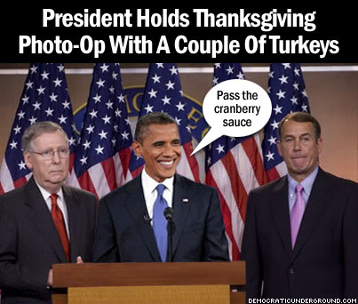 121121-president-holds-thanksgiving-photo-op-with-a-couple-of-turkeys.jpg
