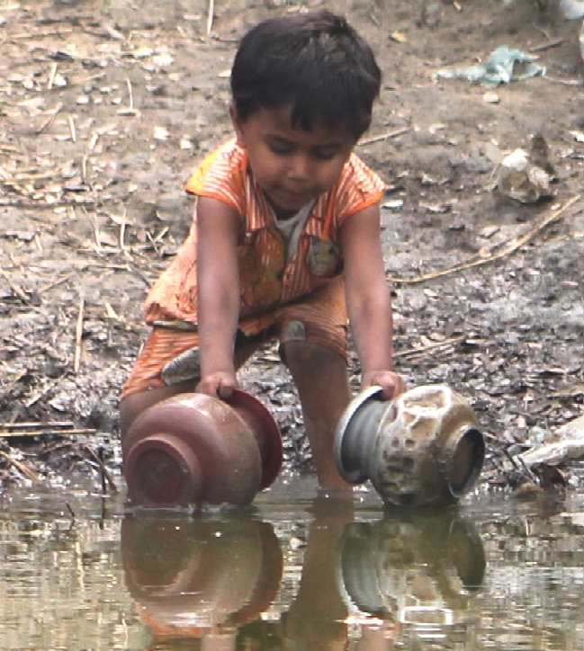 water-child-filling-containers-from-dirty-pond-third-world-poverty.jpg